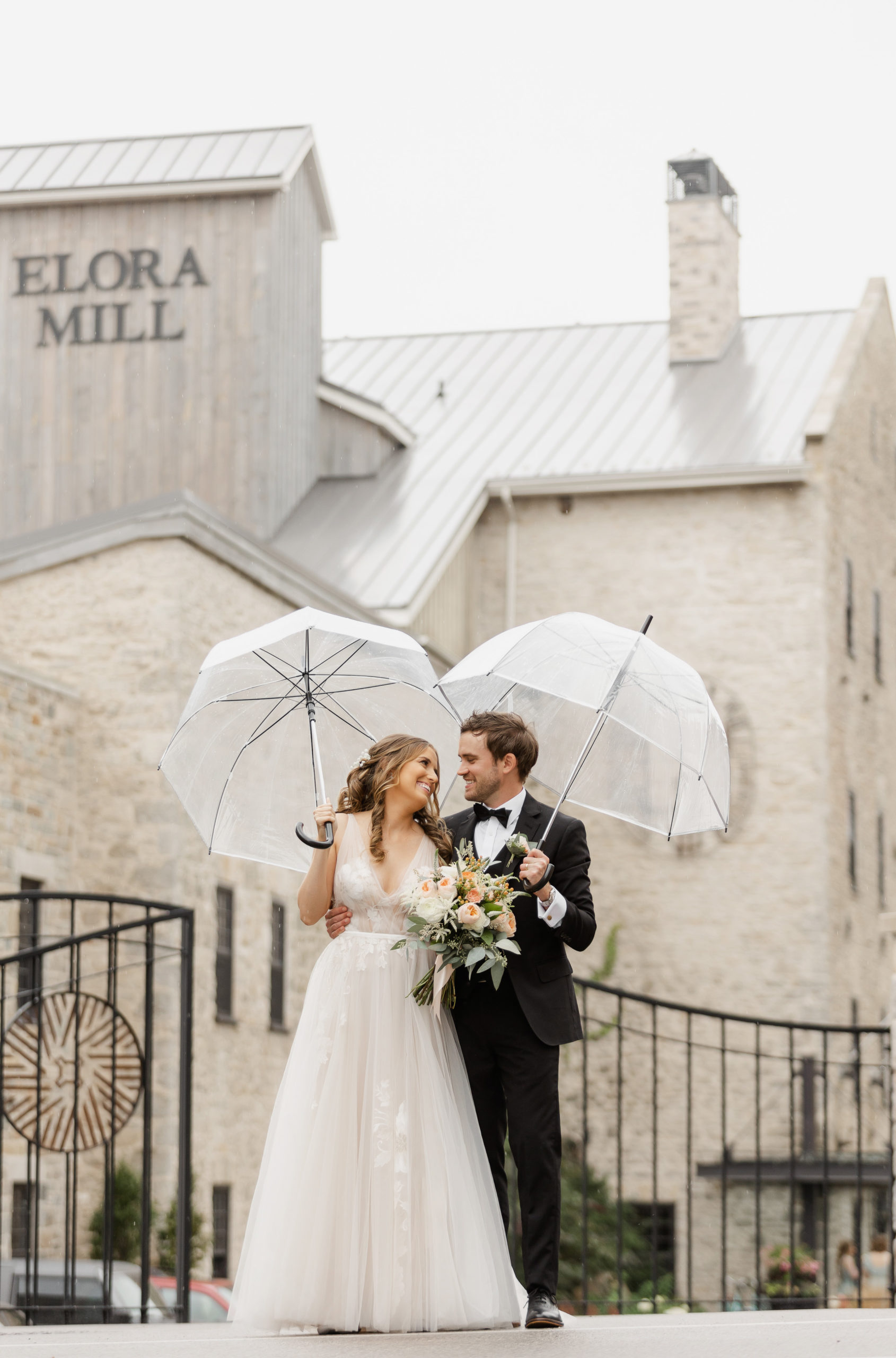 a rainy day wedding at elora mill